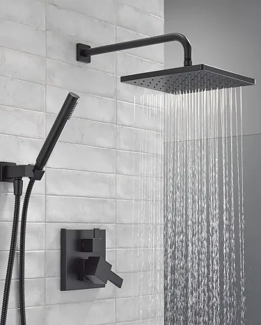 Delta matte black Square Pressure Balance Shower Kit working in shower stall with light grey tile. 